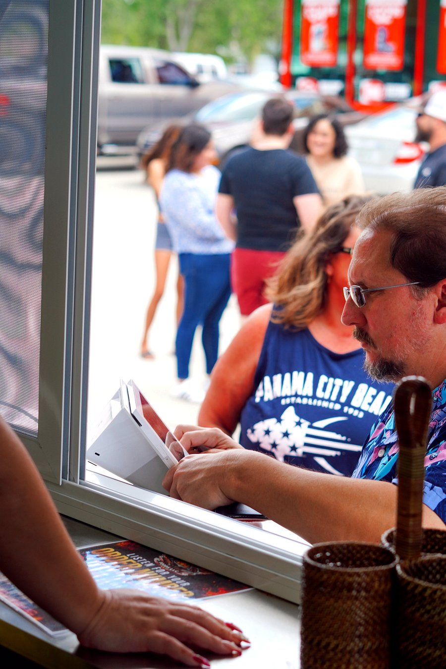 Customers checking the menu